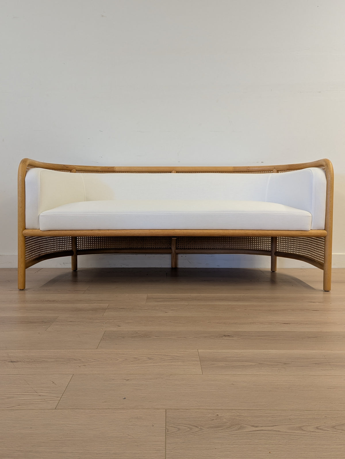Crate & Barrel Fields Cane Settee with White Cushion by Leanne Ford