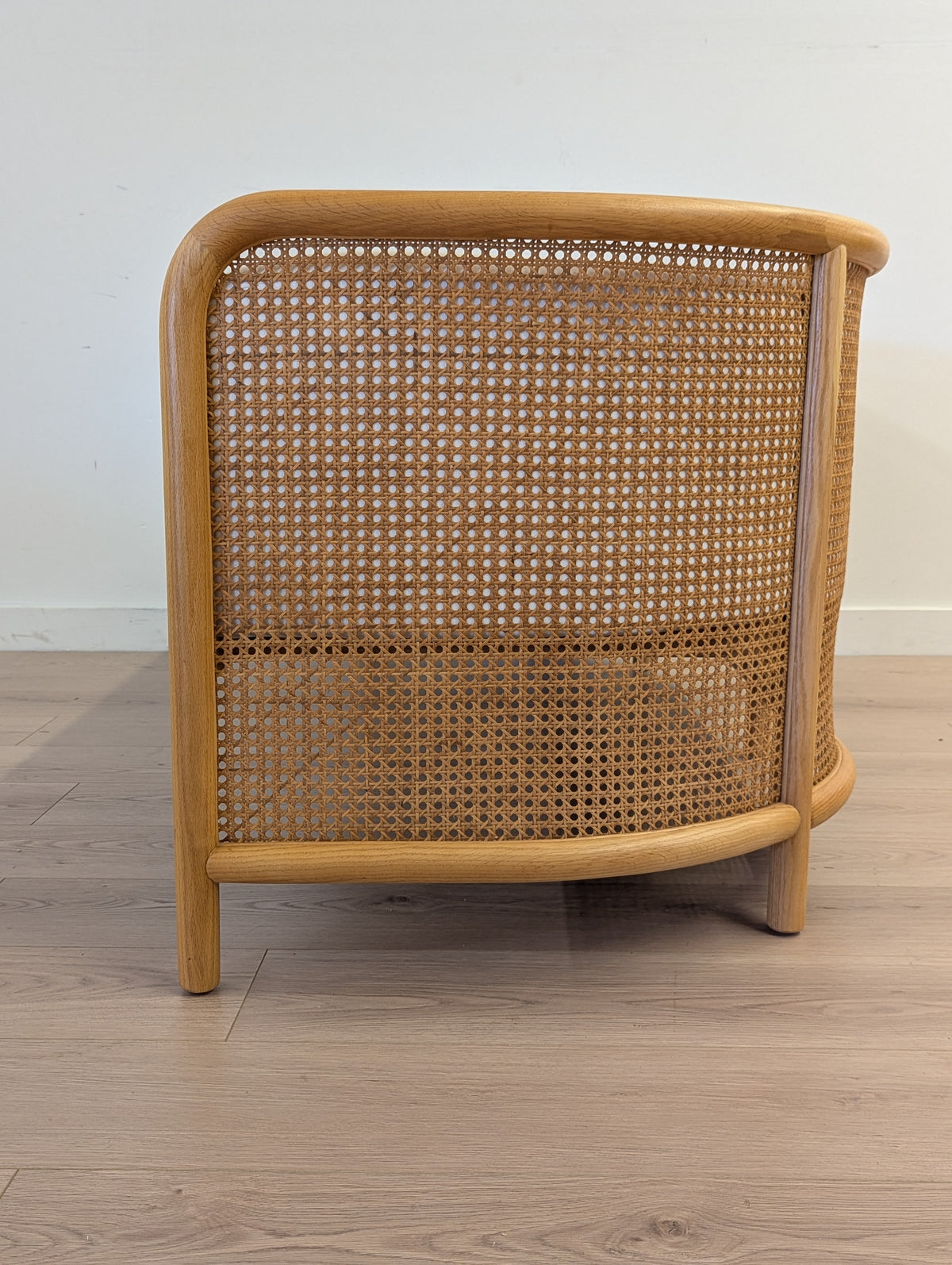 Crate & Barrel Fields Cane Settee with White Cushion by Leanne Ford