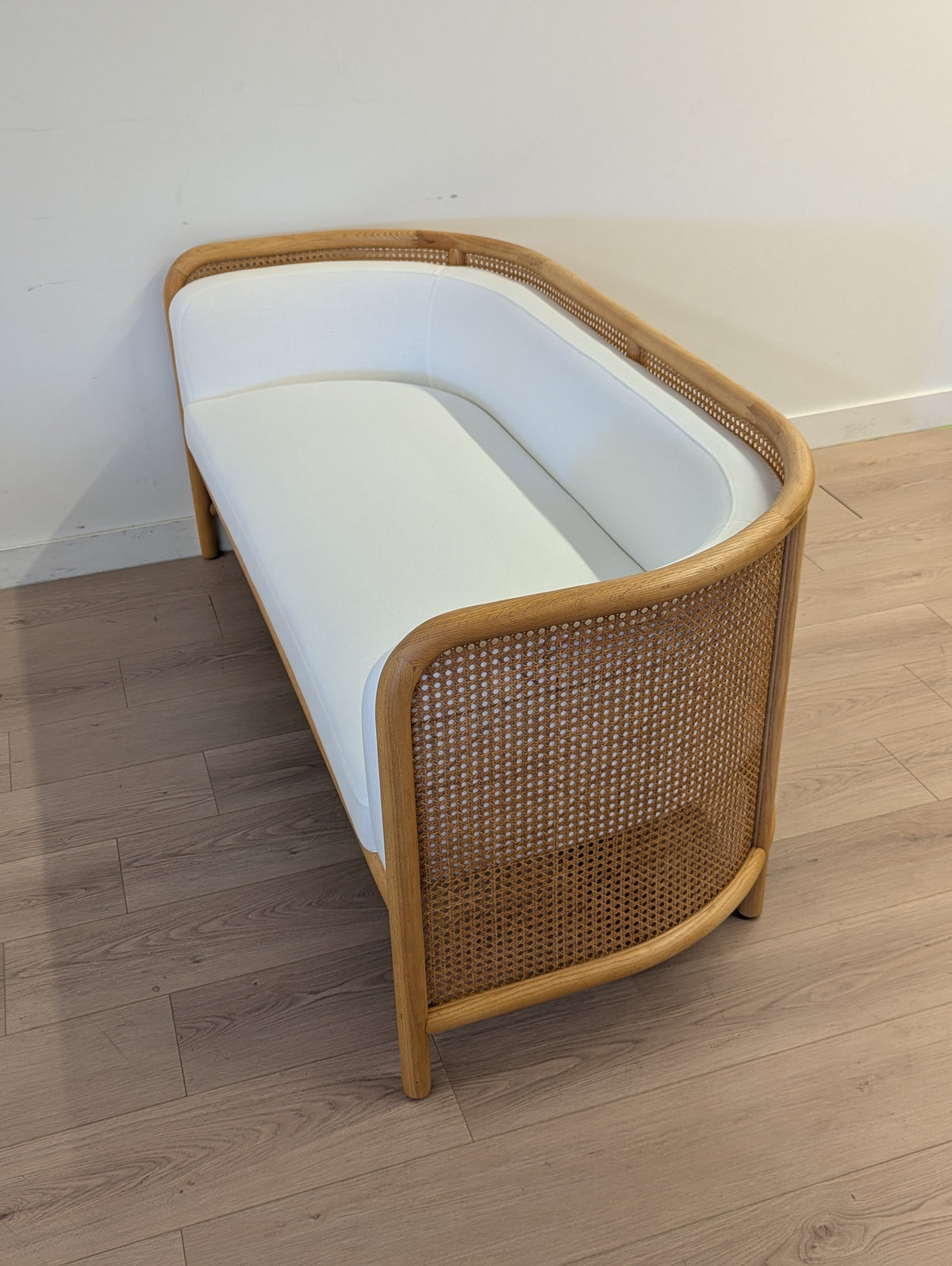 Crate & Barrel Fields Cane Settee with White Cushion by Leanne Ford