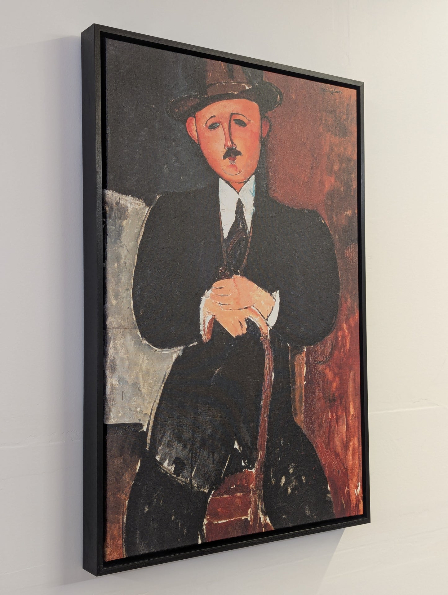 Seated Man With a Cane by Amedeo Modigliani