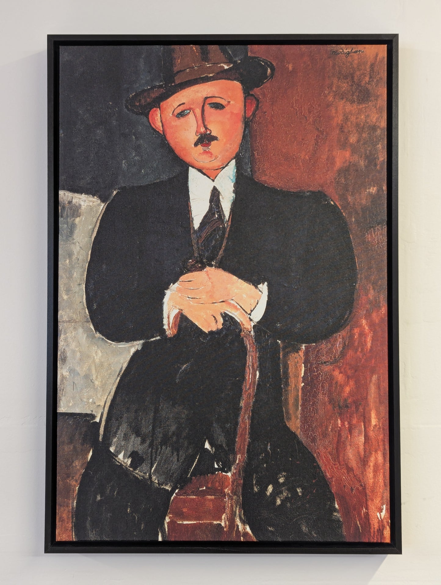 Seated Man With a Cane by Amedeo Modigliani